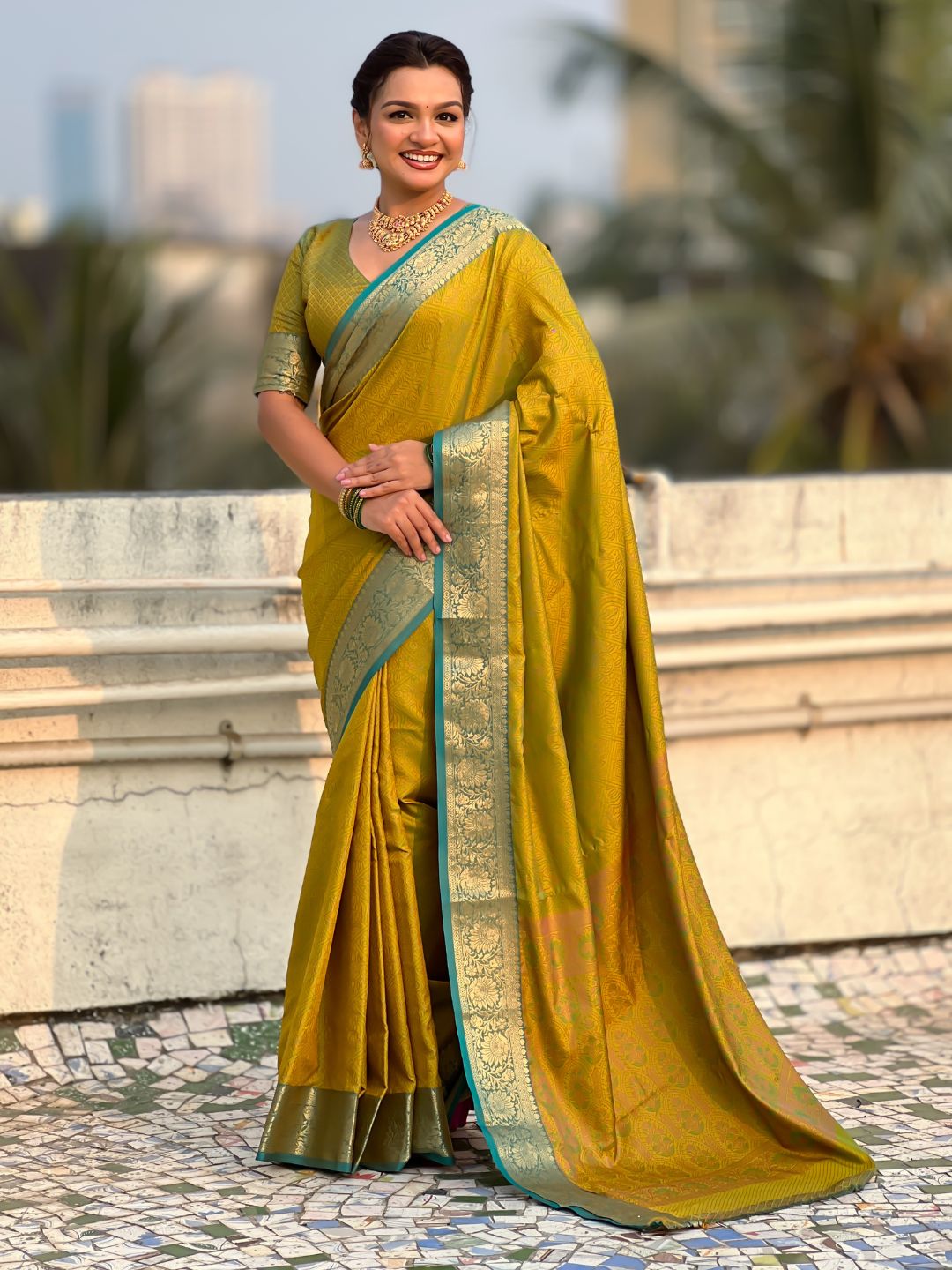 mehendi green soft patola silk saree with bandhani weaving
