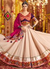 Woman in traditional Indian attire with a colorful background