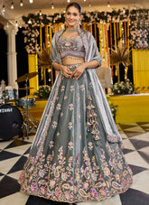 Captivating green tissue lehenga choli with embroidery and dupatta