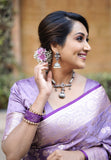 Divya in our Lavender Banarasi Jaal Satin Silk Pink Zari Woven Saree