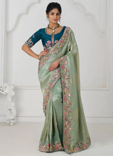 Elegant Green Embroidered Dola Silk Saree for Indian Weddings
