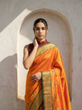 festive orange silk saree with rich woven traditional pallu