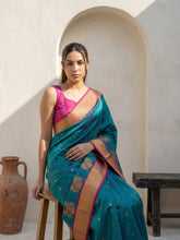 traditional paithani saree with peacock panel border design