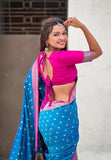 Gold zari detailing on royal blue silk saree