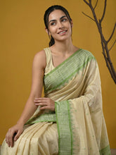 elegant pista green silk saree with contrast traditional border