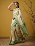 festive pista green saree with woven pallu and tassel detailing