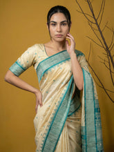 traditional rama green silk saree with contrast woven border