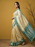 festive rama green saree with tassel pallu and elegant drape