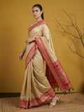 festive red saree with graceful soft silk drape and rich motifs