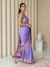 elegant lavender silk saree featuring sparrow design pallu and woven border