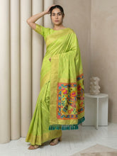 pista green soft silk saree with gold zari floral motifs and contrast meenakari pallu