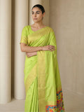 traditional pista green silk saree with floral motifs and rich pallu detail