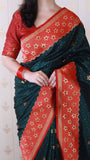 Bottle Green Soft Silk Banarasi Wavy Unique Zari Woven Saree