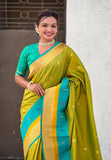 Mehendi Green Paithani Silk Saree with Muniya Satin Border