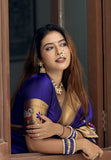 Sakshi in our Violet Paithani Silk Saree with Half Half Concept Big Border Zari Woven Saree