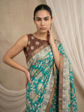 traditional silk saree with peacock printed pallu and tassels