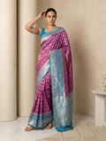 traditional patola saree with contrast brocade blouse and graceful drape