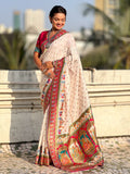 festive silk saree with artistic woven detailing and brocade blouse