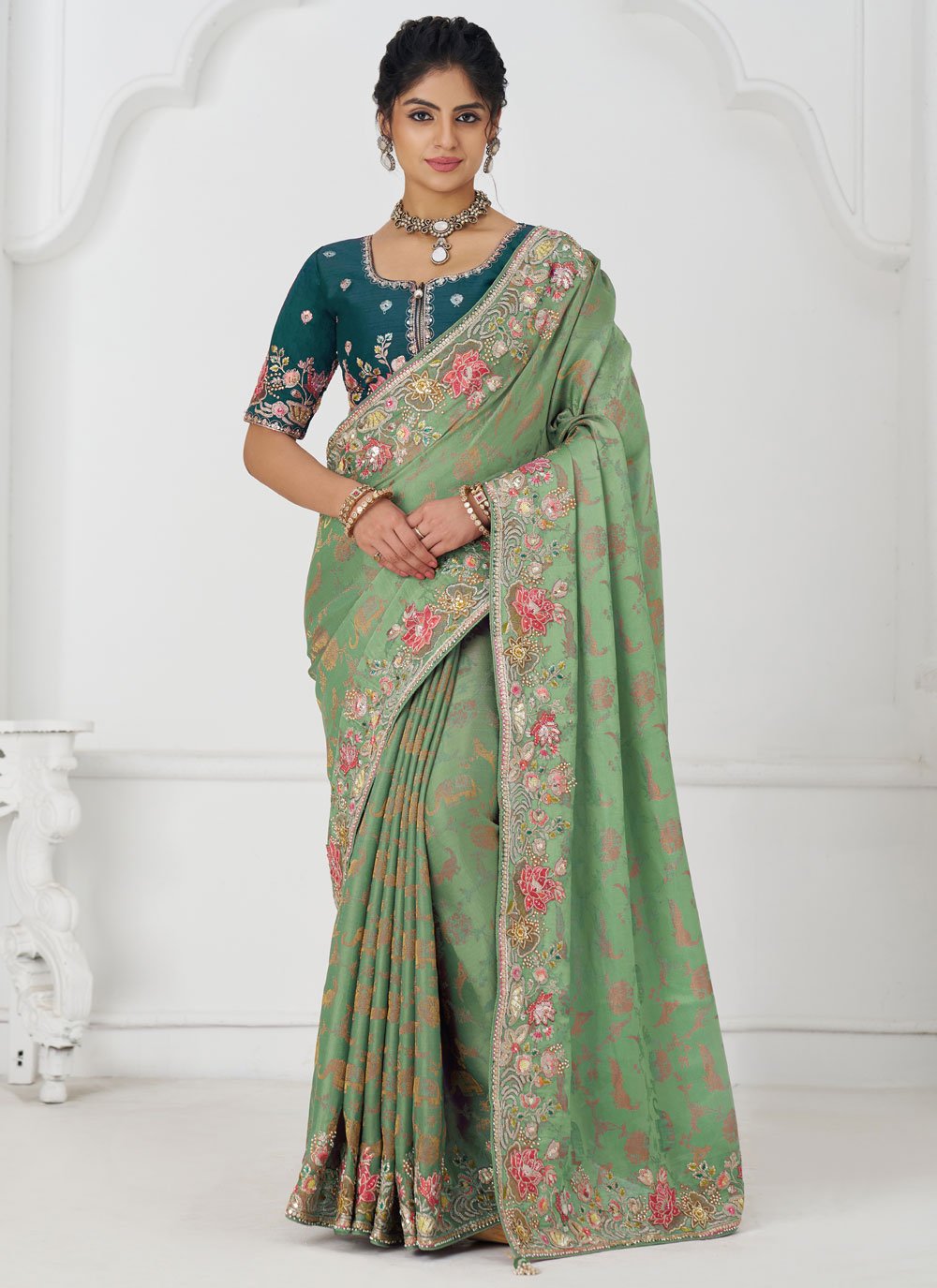 Opulent Green Embroidered Dola Silk Bridal Saree with Sequins