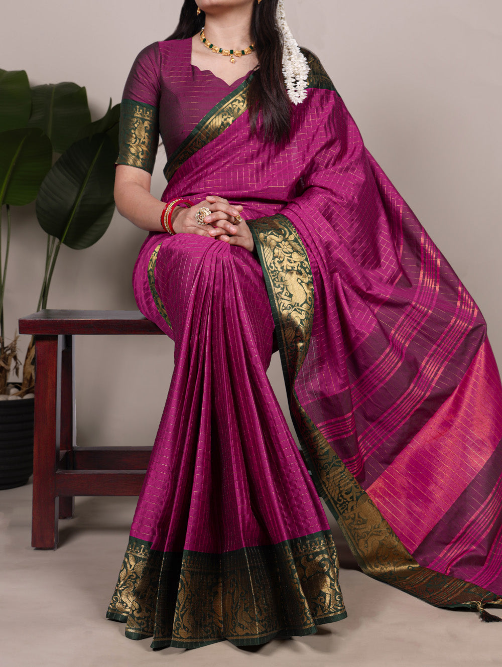 Rani pink poly cotton chex saree with zari work