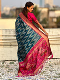 elegant denim blue silk saree with rich pichwai pallu and simple border