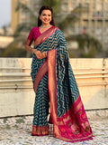 traditional denim blue soft silk saree with woven ikat pattern and brocade blouse