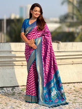 soft silk saree with ikat motifs and zari weaving design
