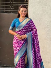 elegant wine silk saree with rich pichwai pallu and simple border