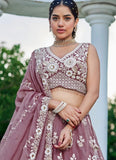 Stylish lavender embroidered lehenga choli for weddings and parties