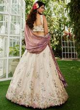 Purple Tissue Lehenga Choli with Cream Blouse and Green-Gold Embroidered Dupatta for Parties