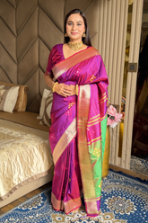 Magenta Soft Silk Ikkat Patola Saree with Meenakari Motifs Peacock Pallu and Gold Zari Border