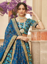Art Silk Zari and Sequins Embroidered Lehenga In Blue