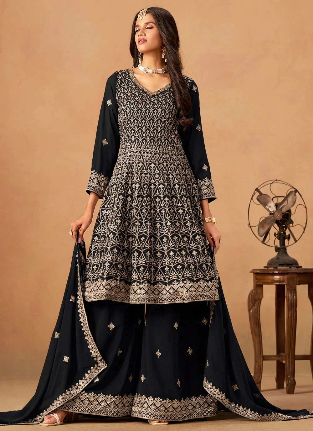 Designer black palazzo suit for festive wear