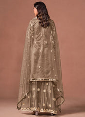 Brown net embroidered suit set with matching palazzo bottom and dupatta.