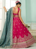 pink cosmos silk lehenga with beads, sequins, stone and thread embroidery, paired with teal dupatta and sweetheart neck blouse