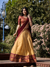 Cream Kanchipuram silk lehenga choli with zari weaving
