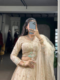 Cream Lehenga Choli with Net Dupatta