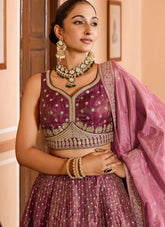 Rose gold tissue silk engagement lehenga with zari embroidery