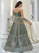 Elegant Dusty Green Butterfly Net Party Wear Lehenga Set