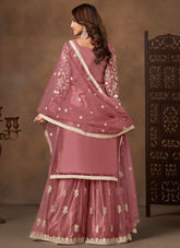 Pink net embroidered palazzo salwar suit with satin inner and matching dupatta