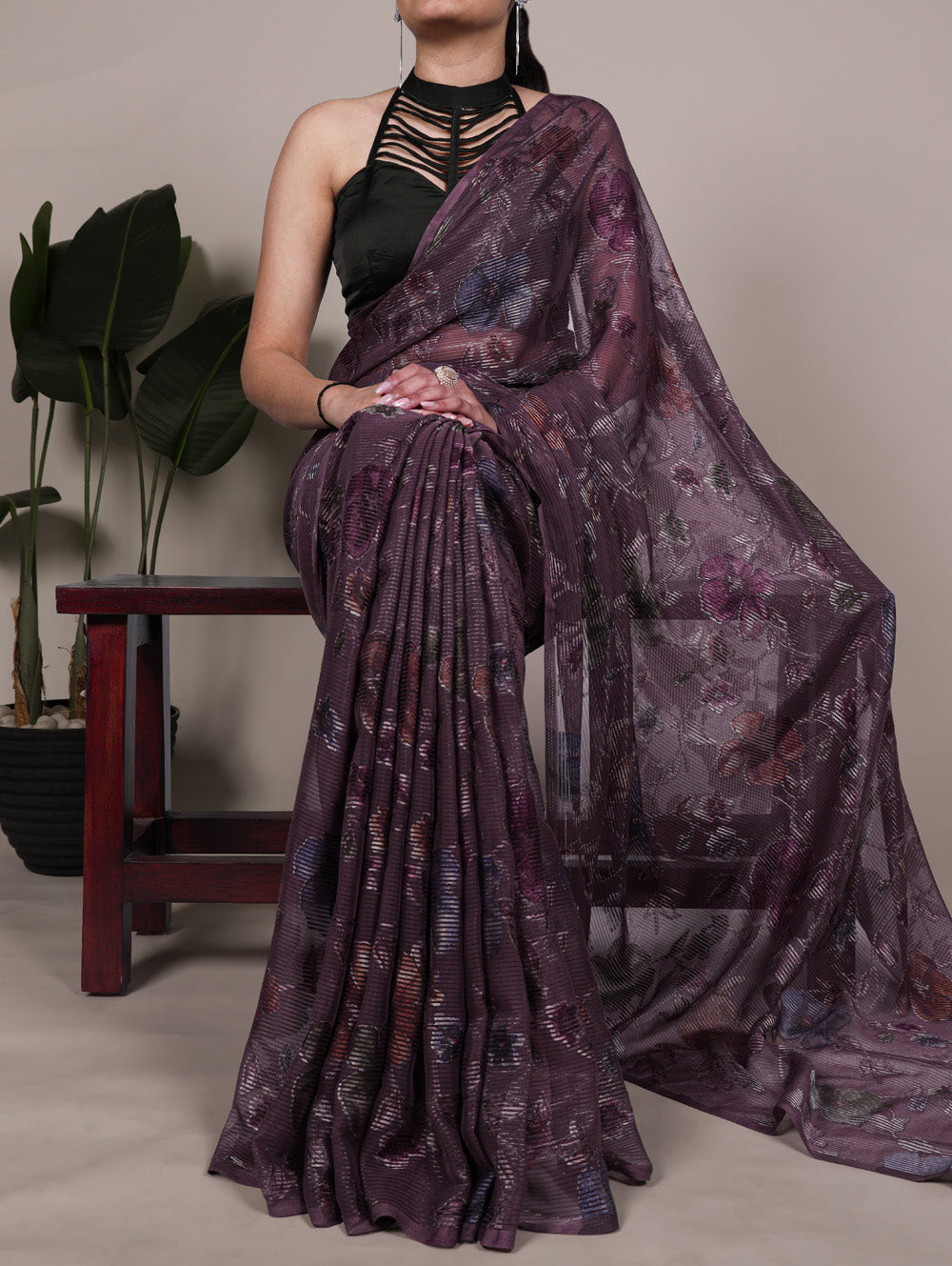 Wine color lurex brasso saree with floral work