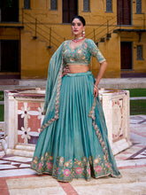 Sky blue sequins and thread work bridal lehenga