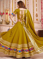 Fluorescent green choli with mirror and kodi handwork on border