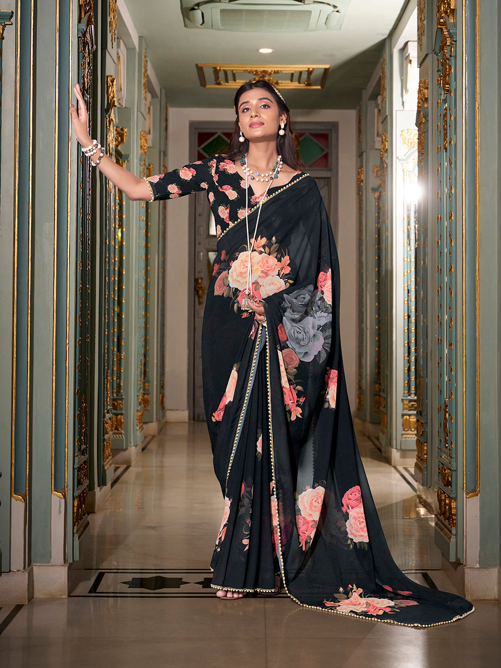 Black georgette saree with printed pearl lace border