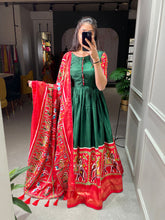 Green Color Patola And Foil Printed Dola Silk Dress