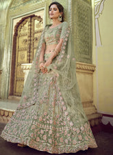 Green Color Soft Net Sequins And Zari Work Lehenga Choli