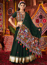 Green mirror work viscose cotton lehenga choli with dupatta for Navratri Garba, featuring kutchi embroidery and tassel detailing