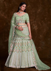 Green Net Zarkan and Thread designer bridal lehenga