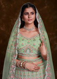 Green Net Zarkan and Thread designer bridal lehenga