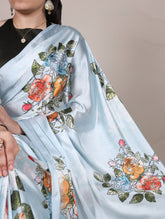Floral printed sky blue saree with mehendi blouse